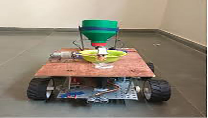 Solar-Powered Automated Seed Sprayer for Sustainable Agriculture